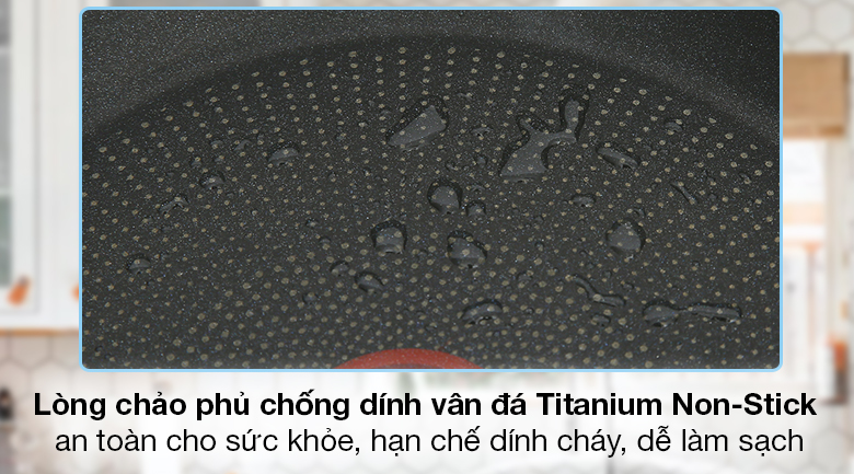 Chảo nhôm sâu chống dính đáy từ 28 cm Tefal Ultimate G2681972 - Bề mặt lòng chảo phủ lớp chống dính vân đá Titanium Non-Stick bền bỉ với hơn 48.000 lần chà nhám